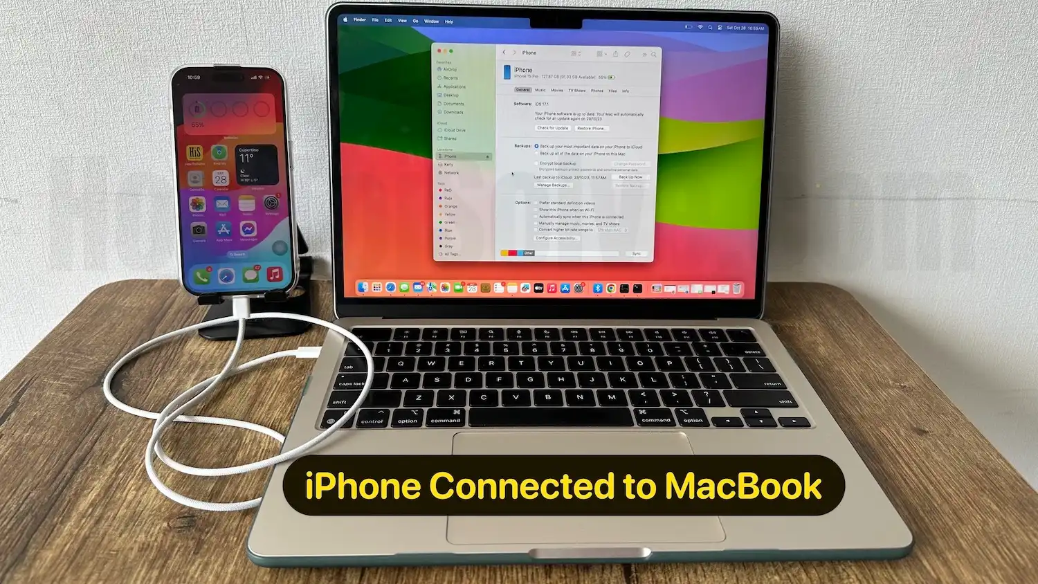 Apple iPhone connected to MacBook to get new software Update